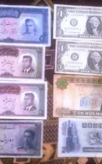 چند قطعه اسکناس و سکه