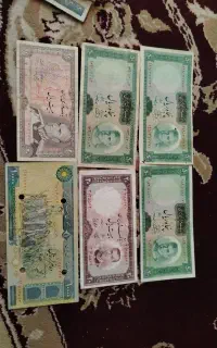 تعدادی سکه و اسکناس کلکسیونی
