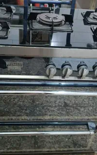 اجاق گازطرح فرصفحه شیشه ای بدنه استیل
