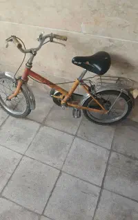 دوچرخه بچه گانه زرد قناری