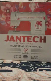 چرخ خیاطی آکبند جانتک ۳۲کاره sp7900