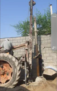حفاری چاه آب باتراکتور