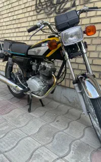 هندا۱۲۵ مدل۹۰ طرنا مشکی‌زرد