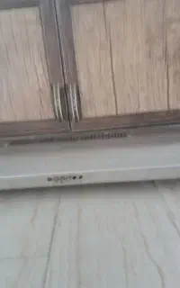هود تمام استیل با کابینت که در عکس مشاهده می کنید