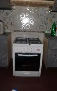 گاز چهار شعله فر و جوجه گردان دار