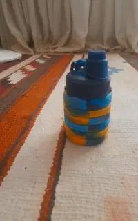 قمقمه سیلیکونی رنگ نارنجی  آبی سرمه ای