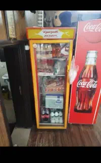 خریدار و فروشنده یخچال نوشابه و رستورانی قصابی