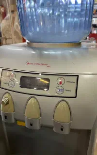 آب سرد کن و گرم کم همراه با یخچال