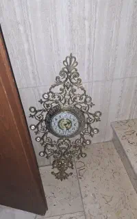 میز تلویزیون برنز و ساعت دیواری برنز