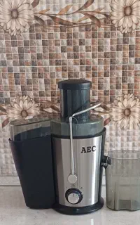 چرخ گوشت وآبمیوه گیری