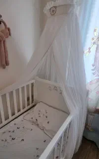 تور پشه بند دور تخت نوزاد