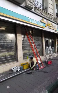 کرکره برقی و  جک پارکینگ و درب شیشه ای اتومات
