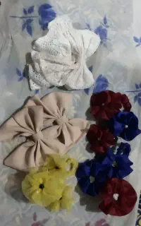 انواع گل سر وکش مو در طرح و سایزهای مختلف