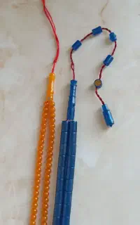 تسبیح سندلوس و کهربا مهر دار