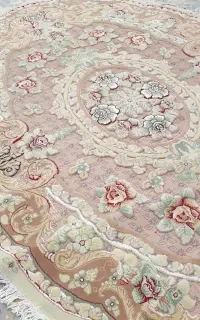 فرش مدل بیضی گل برجسته در حد نو