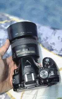 دوربین نیکون به همراه لنز مخصوص پرتره