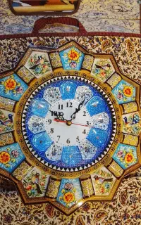 ساعت خاتم اعلا با زمینه میناکاری و حاشیه گل مرغ