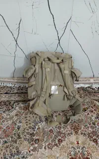 کوله پشتی وپوتین