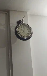 ساعت دیواری دو طرفه