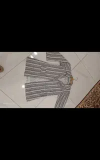 لباس نو و در حد نو