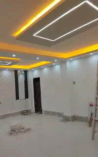 رنگ‌آمیزی ساختمان در و پنجره نصب کاغذ دیواری
