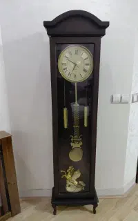 ساعت ومجسمه وتنگ