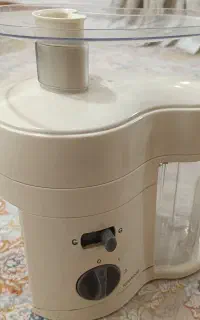 دستگاه آب میوه گیری به همراه دو آسیاب