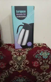 فلاکس چای استیل بدون شیشه دو لیتری و کتری