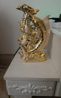 گلدان و مجسمه طلایی