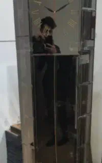 ساعت ایستاده اینه ایی نقره ایی