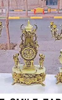 شمعدان و ساعت برنزی