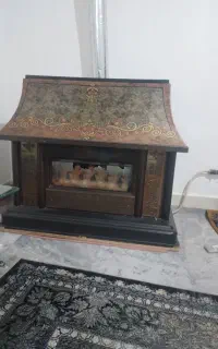 بخاری شمینه کار کرده به فروش میرسه
