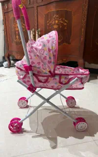 اسباب بازی کالسکه تاشو صورتی دخترانه ناز