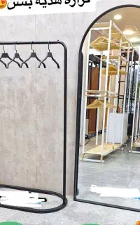 بند رخت رگال کنار آینه کمد دار