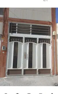 درب‌ اهنی پارکینگ ۳ لنگه