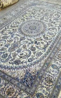 دو عدد فرش دست باف ۶متری و ۹‌متری