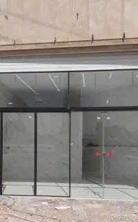 درب کرکره ای برقی شیشه سکوریت