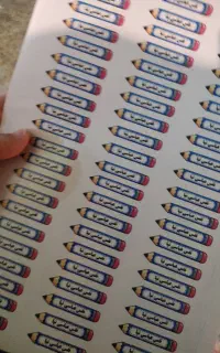 تیکت اسم کتاب و مداد