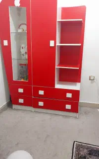 کمد دارای کتابخانه وجا لباس وویترین