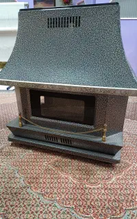 بخاری گازی طرح شومینه بنیس