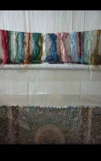 به یک خانم که قالی بافی بلد باشد نیازمندیم