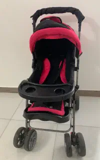 کالسکه صورتی مشکی