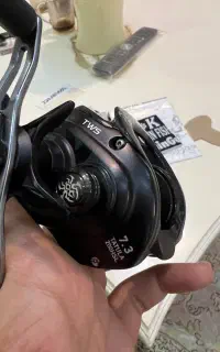 چرخ ماهیگیری بیت کست daiwa tatula 200 hsl