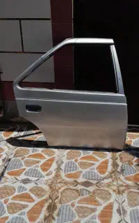 درب پژو عقب نقره ای