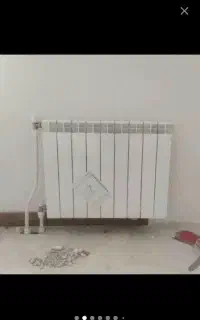 نصاب رادیاتور گرمایشی ساختمان- رادیاتور شوفاژ