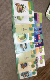 کتاب به همراه جزوهٔ کلاس دوازدهم تجربی