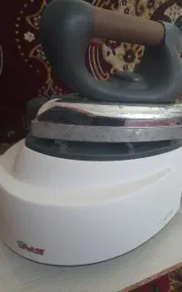 اتو مخزن دار