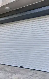 درب برقی و دوربین مداربسته و جک بازویی