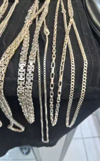 زنجیر گردنی و دستبند نقره به قیمت ساچمه