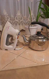 کتری استیل و اتوبخار کاملا سالم درحد نو